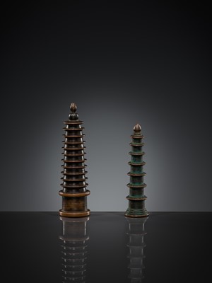 Lot 1105 - TWO COPPER-ALLOY STUPA ‘PARASOL’ FINIALS, 18TH-19TH CENTURY OR EARLIER