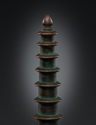 Lot 1105 - TWO COPPER-ALLOY STUPA ‘PARASOL’ FINIALS, 18TH-19TH CENTURY OR EARLIER