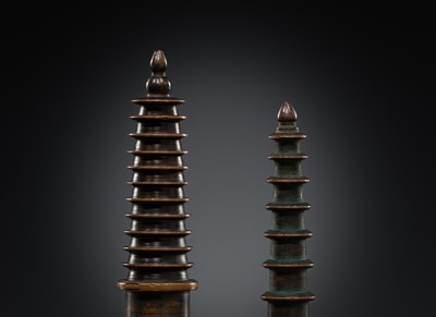 Lot 1105 - TWO COPPER-ALLOY STUPA ‘PARASOL’ FINIALS, 18TH-19TH CENTURY OR EARLIER