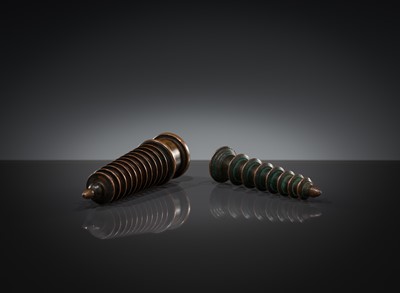 Lot 1105 - TWO COPPER-ALLOY STUPA ‘PARASOL’ FINIALS, 18TH-19TH CENTURY OR EARLIER