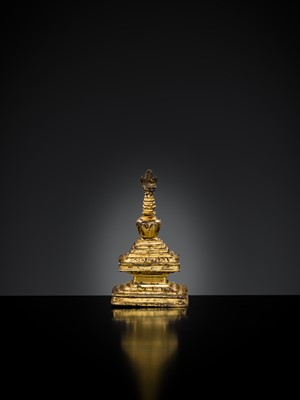 Lot 301 - A RARE TIBETAN GILT BRONZE MINIATURE STUPA, 18TH CENTURY