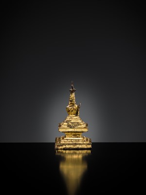 Lot 301 - A RARE TIBETAN GILT BRONZE MINIATURE STUPA, 18TH CENTURY