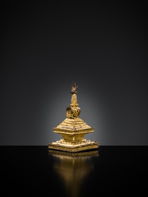 Lot 301 - A RARE TIBETAN GILT BRONZE MINIATURE STUPA, 18TH CENTURY