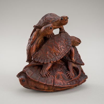 Lot 458 - A LARGE WOOD NETSUKE OF A TURTLE PYRAMID