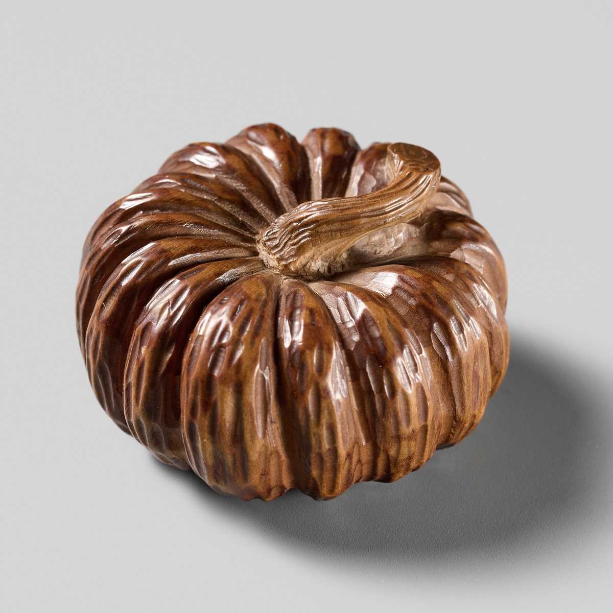 Lot 325 - TADATOSHI: A FINE NAGOYA SCHOOL WOOD NETSUKE OF A PUMPKIN