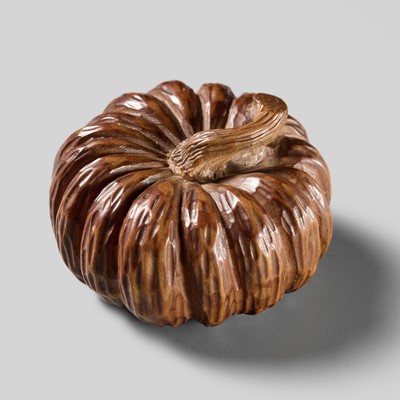 Lot 465 - TADATOSHI: A FINE NAGOYA SCHOOL WOOD NETSUKE OF A PUMPKIN