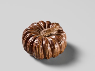 Lot 325 - TADATOSHI: A FINE NAGOYA SCHOOL WOOD NETSUKE OF A PUMPKIN