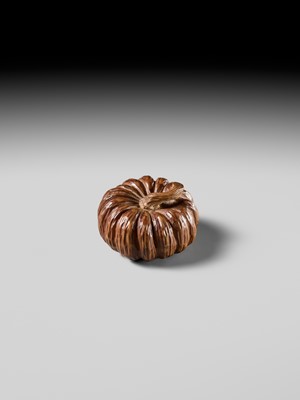 Lot 325 - TADATOSHI: A FINE NAGOYA SCHOOL WOOD NETSUKE OF A PUMPKIN