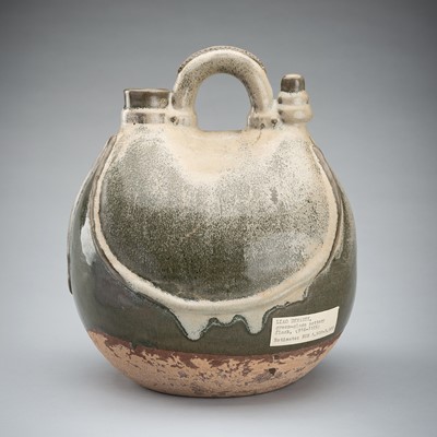 Lot 1843 - A LARGE OLIVE-GREEN GLAZED POTTERY FLASK, PRESUMABLY LIAO DYNASTY