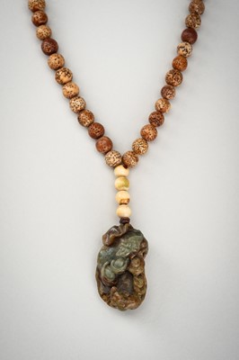 Lot 1786 - A BODHI SEED AND JADE PENDANT NECKLACE