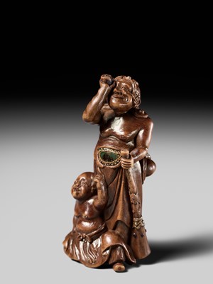 Lot 201 - BAISEN: A RARE WOOD NETSUKE GROUP OF TWO FOREIGN EGG TESTERS