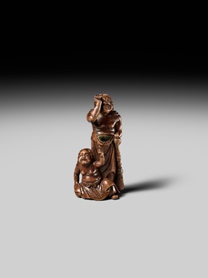 Lot 201 - BAISEN: A RARE WOOD NETSUKE GROUP OF TWO FOREIGN EGG TESTERS