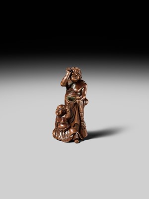 Lot 201 - BAISEN: A RARE WOOD NETSUKE GROUP OF TWO FOREIGN EGG TESTERS