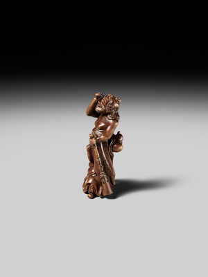 Lot 201 - BAISEN: A RARE WOOD NETSUKE GROUP OF TWO FOREIGN EGG TESTERS