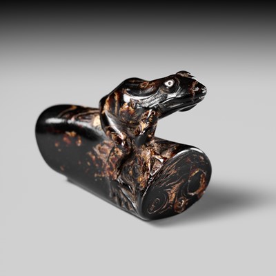 Lot 344 - A RARE UMIMATSU (SEA PINE) NETSUKE OF A FROG ON A LOG