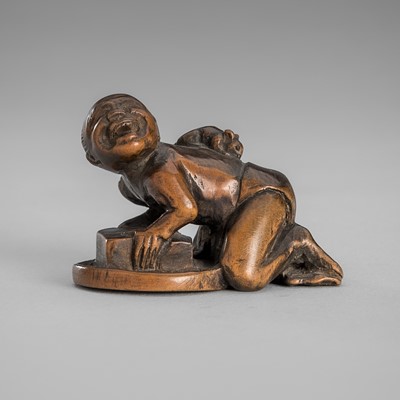 Lot 1654 - MINZAN: A BOXWOOD NETSUKE OF A RAT CATCHER