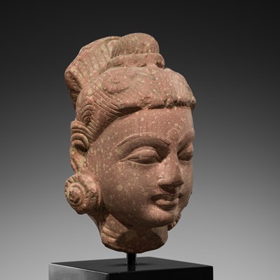 Lot 619 - A FINELY CARVED RED SANDSTONE HEAD OF A GODDESS, MATHURA