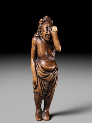 Lot 196 - GESSHO: A SUPERB WOOD NETSUKE OF A FOREIGN EGG TESTER