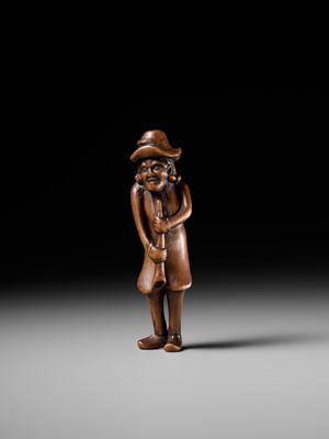 Lot 199 - AN EARLY WOOD NETSUKE OF A DUTCHMAN