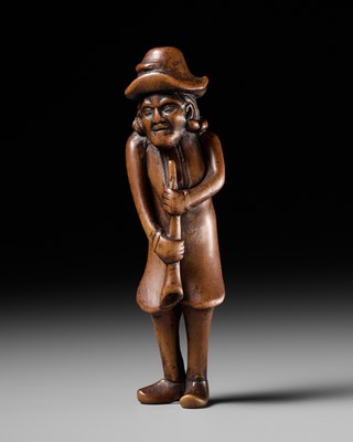 Lot 199 - AN EARLY WOOD NETSUKE OF A DUTCHMAN