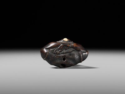 Lot 425 - A RARE WOOD NETSUKE OF AN ONI PARODYING AN EGG TESTER