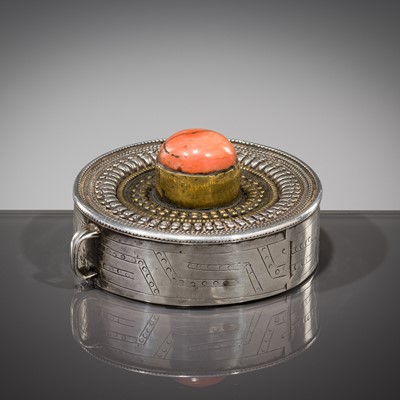 Lot 305 - A SILVER REPOUSSÉ GAU WITH CORAL INLAYS, TIBET, 18TH CENTURY