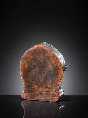 Lot 306 - A PARCEL-GILT SILVER REPOUSSÉ GAU DEPICTING VAJRABHAIRAVA, BHUTAN, 18TH-19TH CENTURY