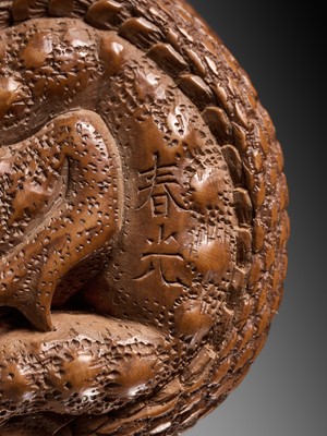 Lot 121 - HARUMITSU: A SUPERB WOOD NETSUKE OF A SNAKE PREYING ON A FROG, SANSUKUMI