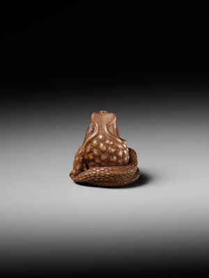 Lot 121 - HARUMITSU: A SUPERB WOOD NETSUKE OF A SNAKE PREYING ON A FROG, SANSUKUMI