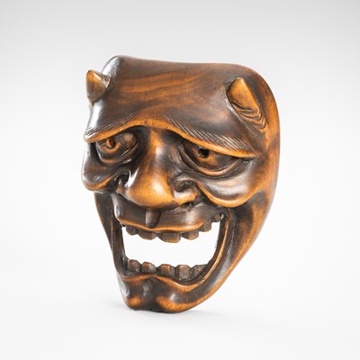Lot 1806 - A BOXWOOD MASK NETSUKE OF AN ONI