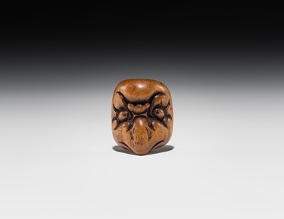 Lot 546 - A WOOD ‘DOUBLE MASK’ NETSUKE OF KARASU TENGU TYPE