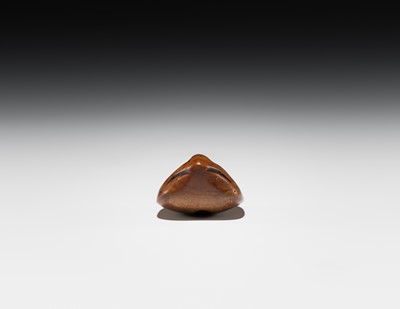 Lot 546 - A WOOD ‘DOUBLE MASK’ NETSUKE OF KARASU TENGU TYPE