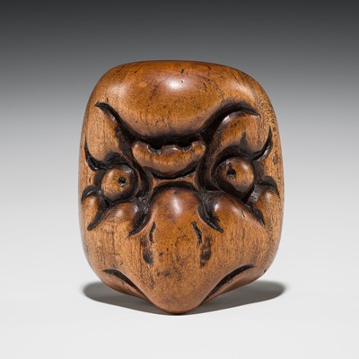 Lot 546 - A WOOD ‘DOUBLE MASK’ NETSUKE OF KARASU TENGU TYPE