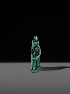A TURQUOISE-GLAZED FAIENCE AMULET OF THE ENTHRONED SEKHMET, LATE PERIOD, DYNASTY XXVI (SAITE)
