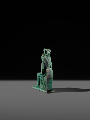 A TURQUOISE-GLAZED FAIENCE AMULET OF THE ENTHRONED SEKHMET, LATE PERIOD, DYNASTY XXVI (SAITE)