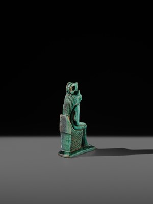 A TURQUOISE-GLAZED FAIENCE AMULET OF THE ENTHRONED SEKHMET, LATE PERIOD, DYNASTY XXVI (SAITE)