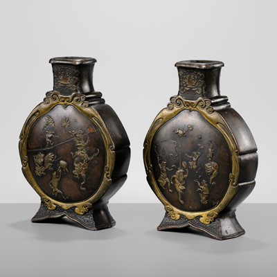 Lot 55 - A PAIR OF BRONZE MOON FLASKS DEPICTING ANTHROPOMORPHIC FROGS