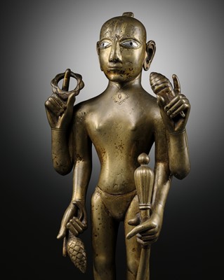 A LARGE AND IMPORTANT SILVER-INLAID BRASS FIGURE OF VISHNU JANARDANA, ORISSA, 16TH CENTURY