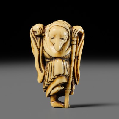 Lot 61 - A FINE IVORY NETSUKE OF A FOX PRIEST (HAKUZOSU)