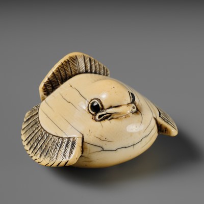 Lot 89 - AN IVORY NETSUKE OF A FUKURA SUZUME (PUFFED-UP SPARROW)