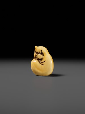 Lot 102 - DORAKU: AN AMUSING IVORY NETSUKE OF OKAME PARODYING DARUMA