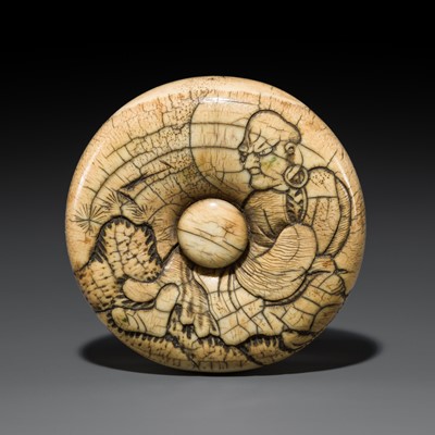 Lot 491 - A LARGE IVORY MANJU NETSUKE OF A RAKAN ON A ROCK