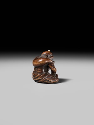 Lot 225 - ISSAI: A FINE WOOD NETSUKE OF FUJIN WITH HIS WIND BAG