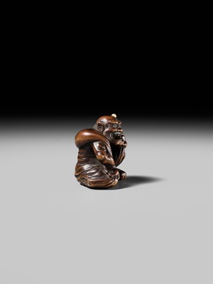 Lot 225 - ISSAI: A FINE WOOD NETSUKE OF FUJIN WITH HIS WIND BAG