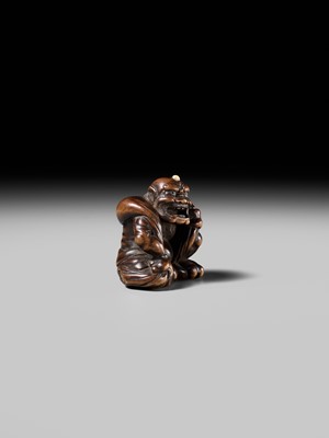 Lot 225 - ISSAI: A FINE WOOD NETSUKE OF FUJIN WITH HIS WIND BAG