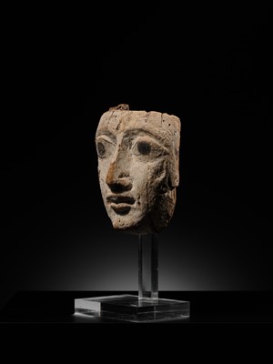 Lot 16 - AN EGYPTIAN GESSO PAINTED WOOD SARCOPHAGUS MASK, LATE PERIOD, 664-332 BC