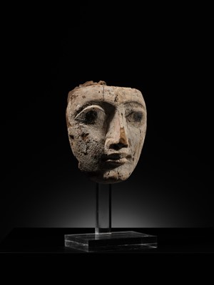 Lot 16 - AN EGYPTIAN GESSO PAINTED WOOD SARCOPHAGUS MASK, LATE PERIOD, 664-332 BC