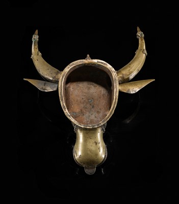 Lot 638 - A BHUTA CULT BRONZE MASK OF NANDI, KARNATAKA, 18TH-19TH CENTURY