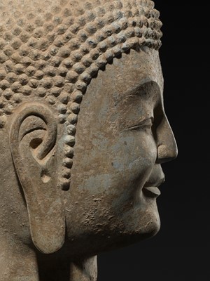 A FINE LIMESTONE HEAD OF BUDDHA, LATE NORTHERN WEI DYNASTY, 6TH CENTURY