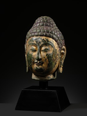 Lot 50 - A RARE AND MAGNIFICENT GILT GREEN MARBLE HEAD OF BUDDHA, NORTHERN QI DYNASTY, 550-577